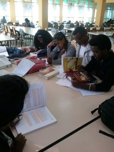 Students reading texbooks