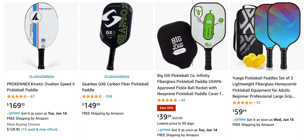 Amazon search results page with a save 33% discount badge shown on a pickleball paddle